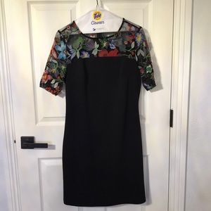 Beautiful black dress with embroidered neckline